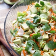 bowl of salad on cutting board