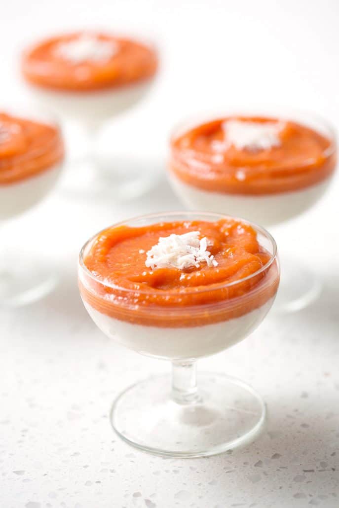 non-dairy panna cotta with fruit puree in champagne coups.