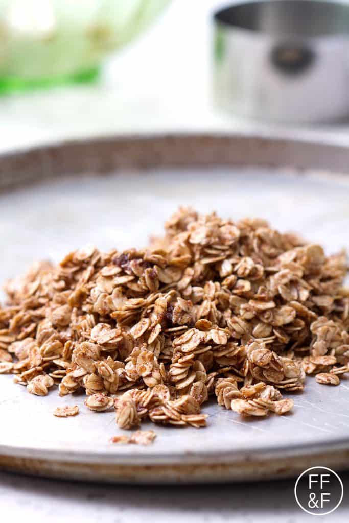 Nut Free Granola that's delicious for breakfast on it's own or to be used in granola bars or sprinkled over a smoothie. This recipe is allergy friendly (gluten, dairy, shellfish, nut, egg, and soy free) with vegan options.