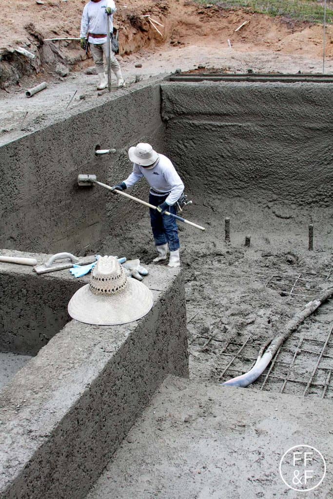 Smoothing out the concrete in the pool. #bethhomeproject