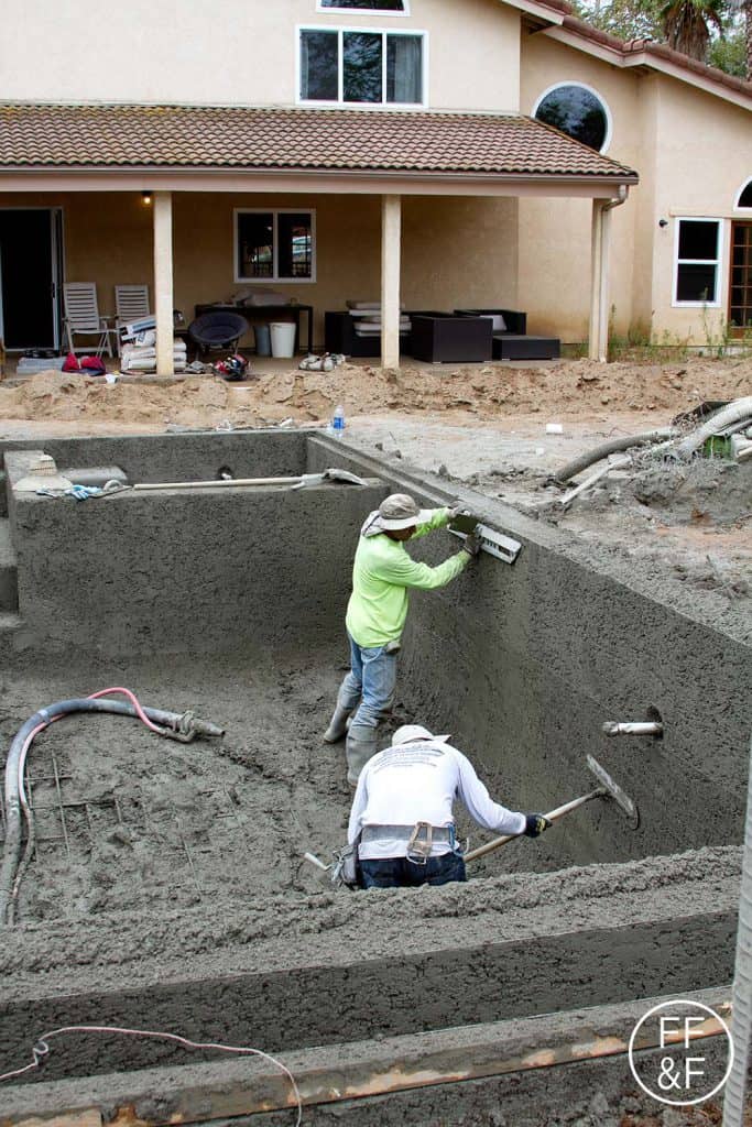 Smoothing out the concrete in the pool. #bethhomeproject