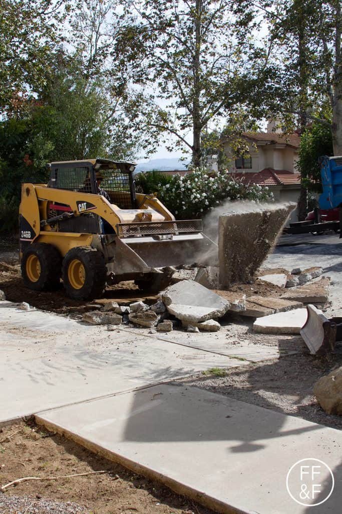 Demo of driveway during front yard renovation.
