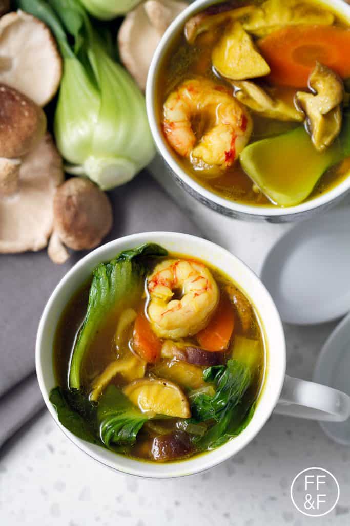 Packed full of delicious and healthy ingredients like turmeric, bok choy and shrimp for a healthy gluten free soup recipe.