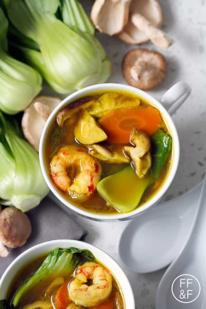 Packed full of delicious and healthy ingredients like turmeric, bok choy and shrimp for a healthy gluten free soup recipe.