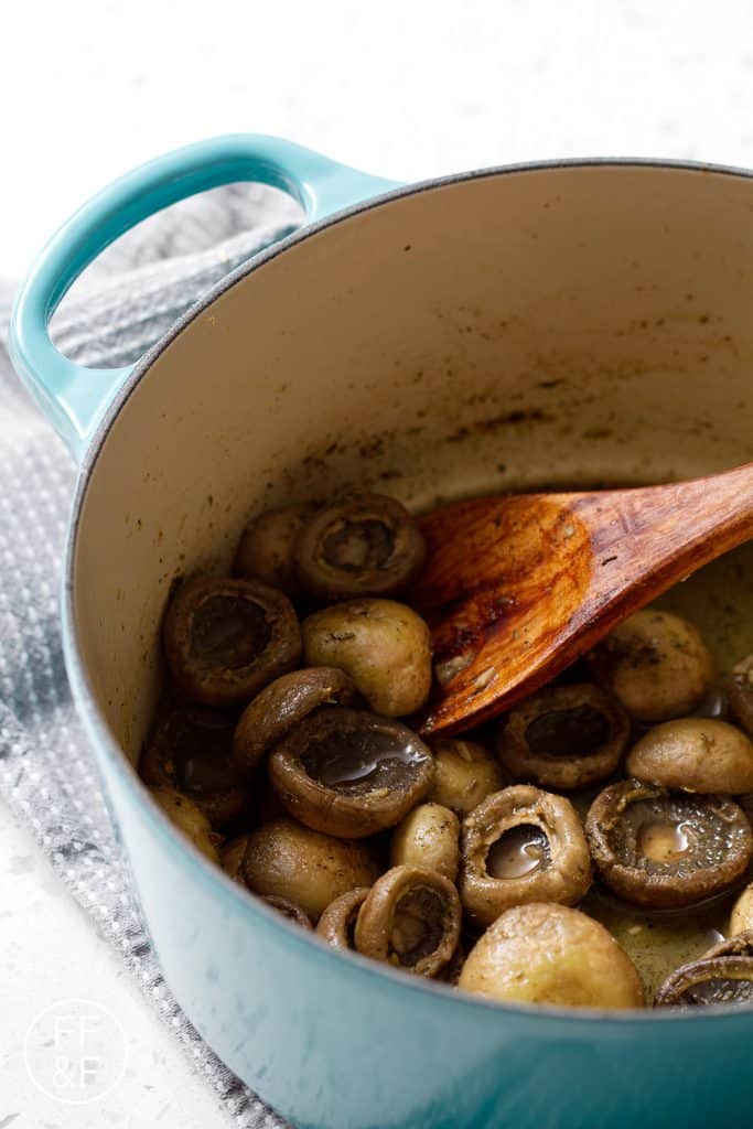 Button mushrooms that are braised in wine and Italian Seasonings. It's super simple, delicious and perfect for those following a vegan, autoimmune protocol diet or people that just want a really great side.