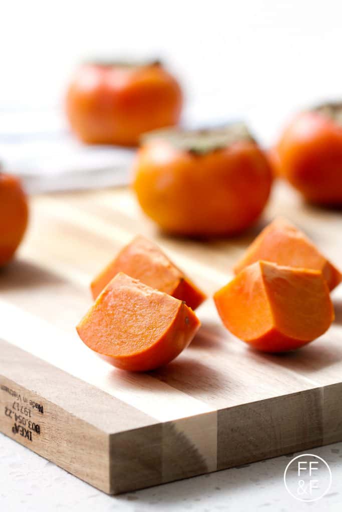 Spiced Persimmon Sparkler is a cinnamony champagne cocktail with a fruity persimmon puree.