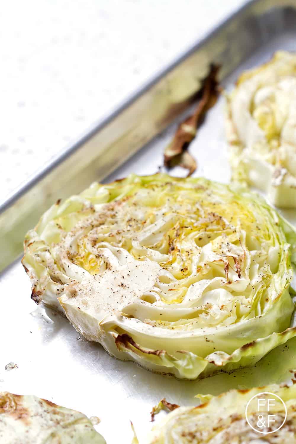 This 4-ingredient Oven Roasted Cabbage that is a delicious and easy as a side to corned beef or steak. This recipe is allergy friendly (gluten, dairy, shellfish, nut, egg, and soy free) and suits the autoimmune protocol, paleo and vegan diets.