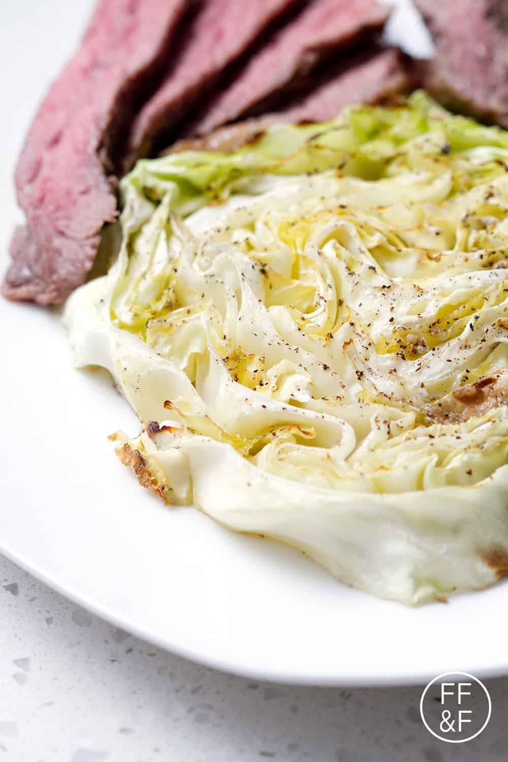 This 4-ingredient Oven Roasted Cabbage that is a delicious and easy as a side to corned beef or steak. This recipe is allergy friendly (gluten, dairy, shellfish, nut, egg, and soy free) and suits the autoimmune protocol, paleo and vegan diets.