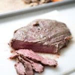 This Sheet Pan Steak Dinner is quick and easy with very little cleanup. This flank steak with mushrooms and sweet potatoes dish is one that your family will request again and again!