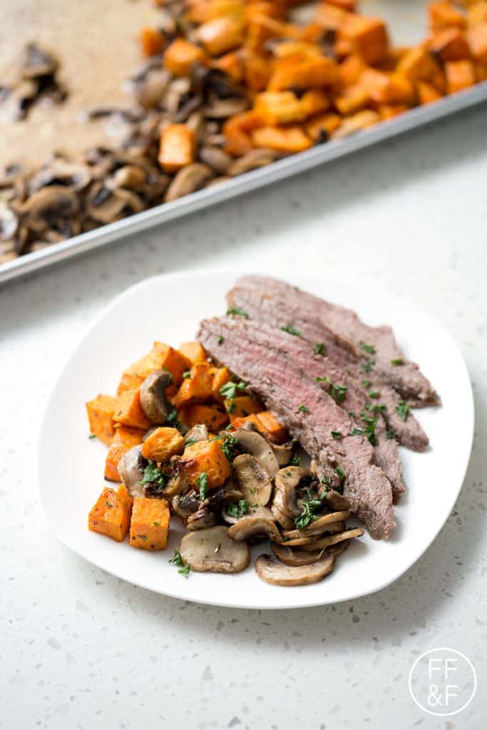 This Sheet Pan Steak Dinner is quick and easy with very little cleanup. This flank steak with mushrooms and sweet potatoes dish is one that your family will request again and again!