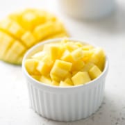 chopped mango over 'sticky rice' in ramekin