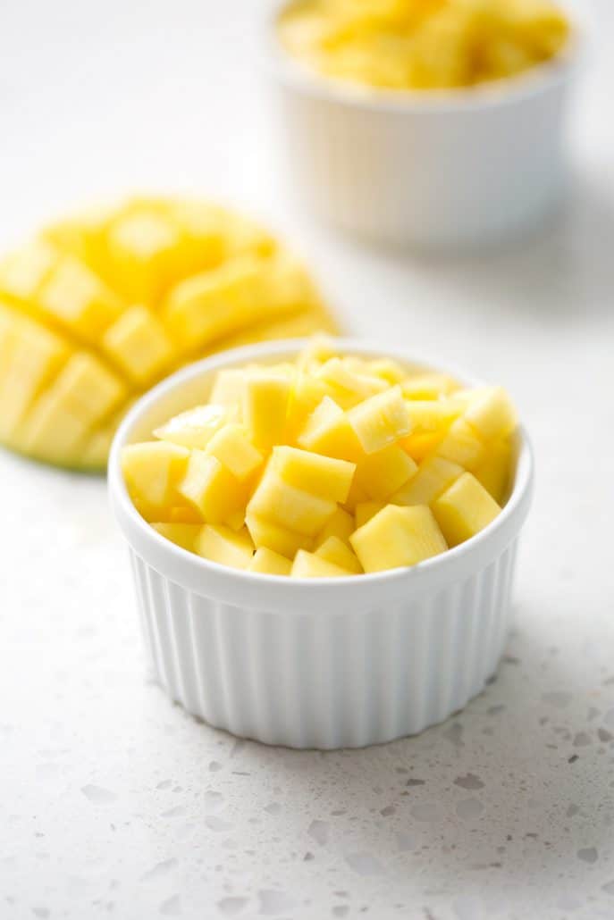 chopped mango over 'sticky rice' in ramekin