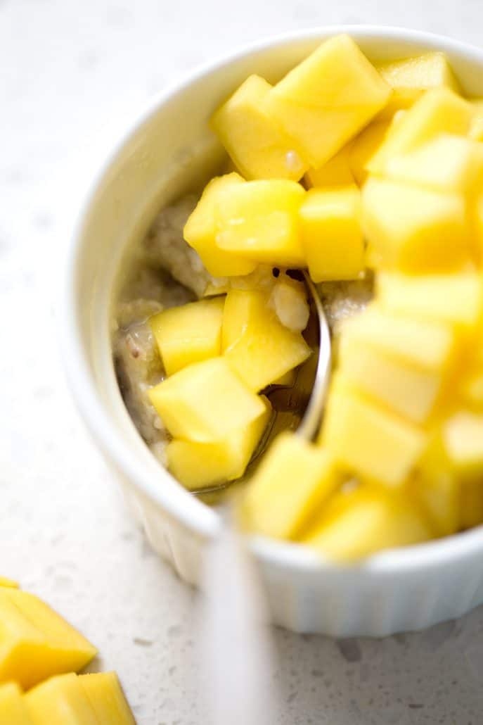 chopped mango over 'sticky rice' in ramekin