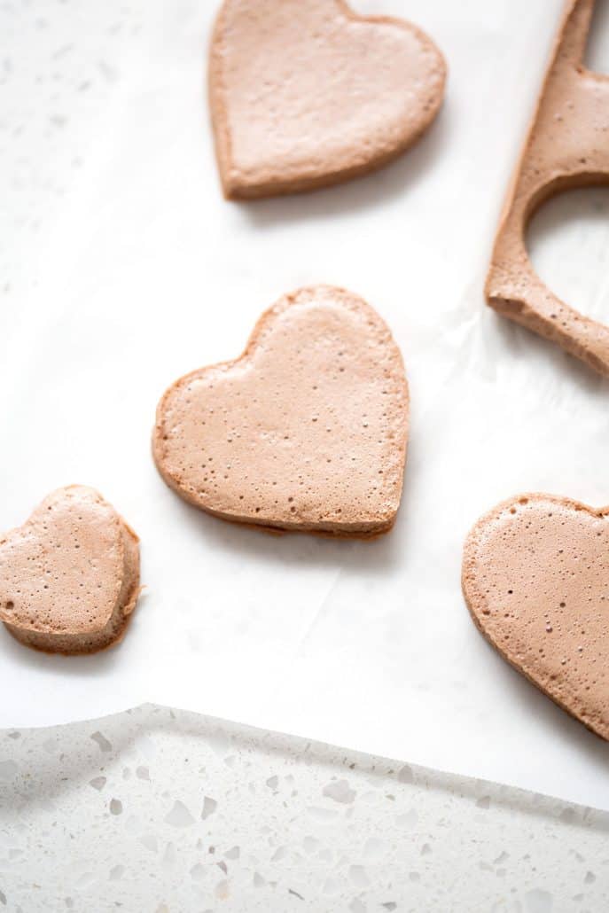 heart shaped chocolate marshmallows on white background