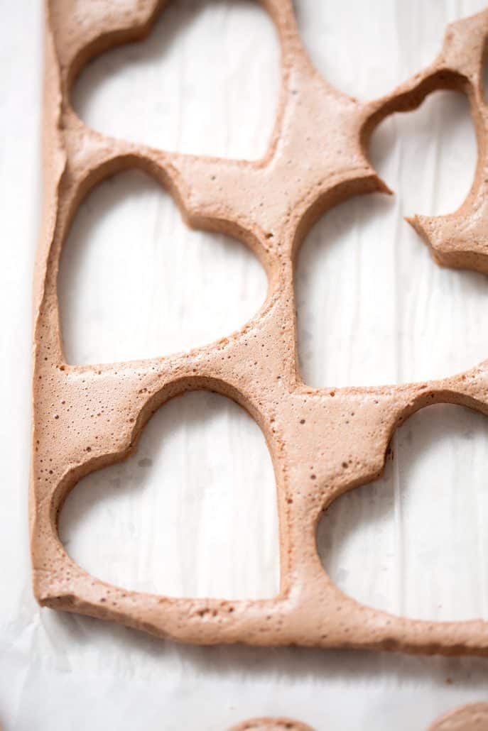 heart shaped chocolate marshmallows on white parchment paper
