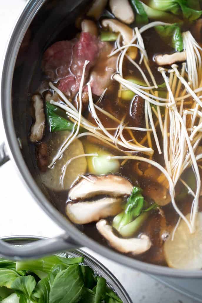 mushrooms, bok choy and meat in bone broth 