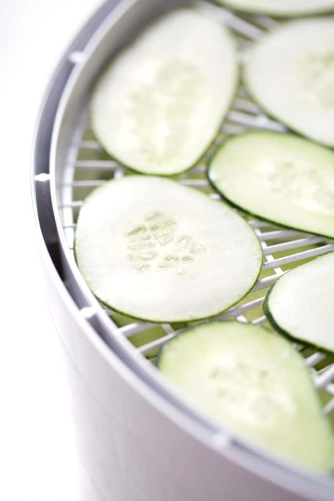 sliced cucumber is dehydrator tray
