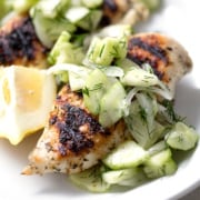 Grilled Chicken and Cucumber Dill Salad on white background