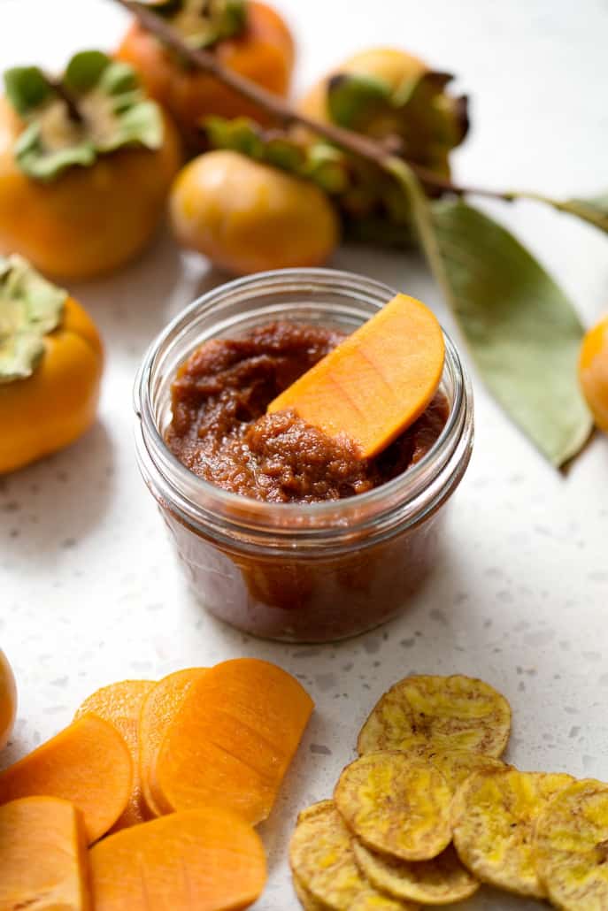 Persimmon season is a short one but I encourage you to scoop them up and make this Spiced Persimmon Butter. It’s similar to pumpkin or apple butter but made with persimmons and some extra spices for those yummy fall and winter flavors. This recipe is allergy friendly (gluten, dairy, shellfish, nut, egg, and soy free) and suits the paleo diets
