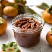 Persimmon season is a short one but I encourage you to scoop them up and make this Spiced Persimmon Butter. It’s similar to pumpkin or apple butter but made with persimmons and some extra spices for those yummy fall and winter flavors. This recipe is allergy friendly (gluten, dairy, shellfish, nut, egg, and soy free) and suits the paleo diets.