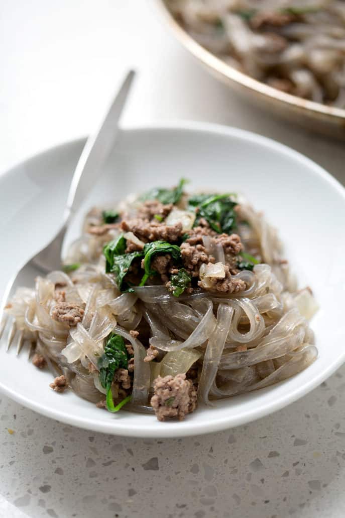 AIP Ground Beef Stroganoff with Spinach recipe is a quick beef stroganoff with ground beef and sweet potato starch noodles. Traditionally stroganoff includes sour cream but I’ve used coconut cream. However, this recipe is delicious cream free! This recipe fits the Autoimmune Protocol (AIP) and Paleo diets.