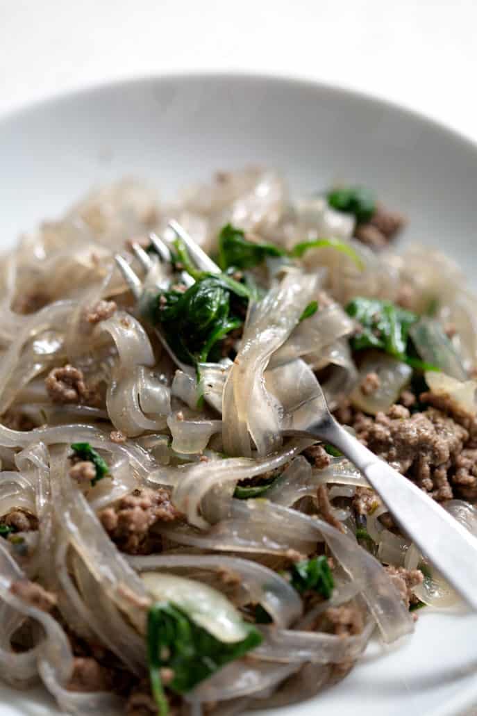 AIP Ground Beef Stroganoff with Spinach recipe is a quick beef stroganoff with ground beef and sweet potato starch noodles. Traditionally stroganoff includes sour cream but I’ve used coconut cream. However, this recipe is delicious cream free! This recipe fits the Autoimmune Protocol (AIP) and Paleo diets.