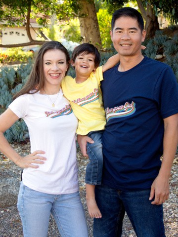 family wearing different colored tshirts