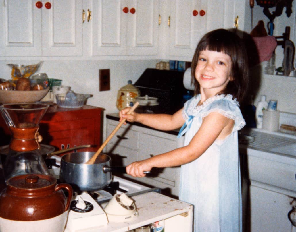 child cooking in kitchen circa 1985