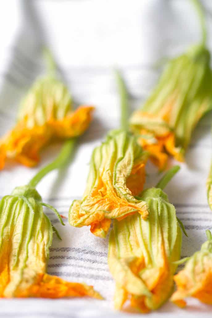 squash blossoms on towel