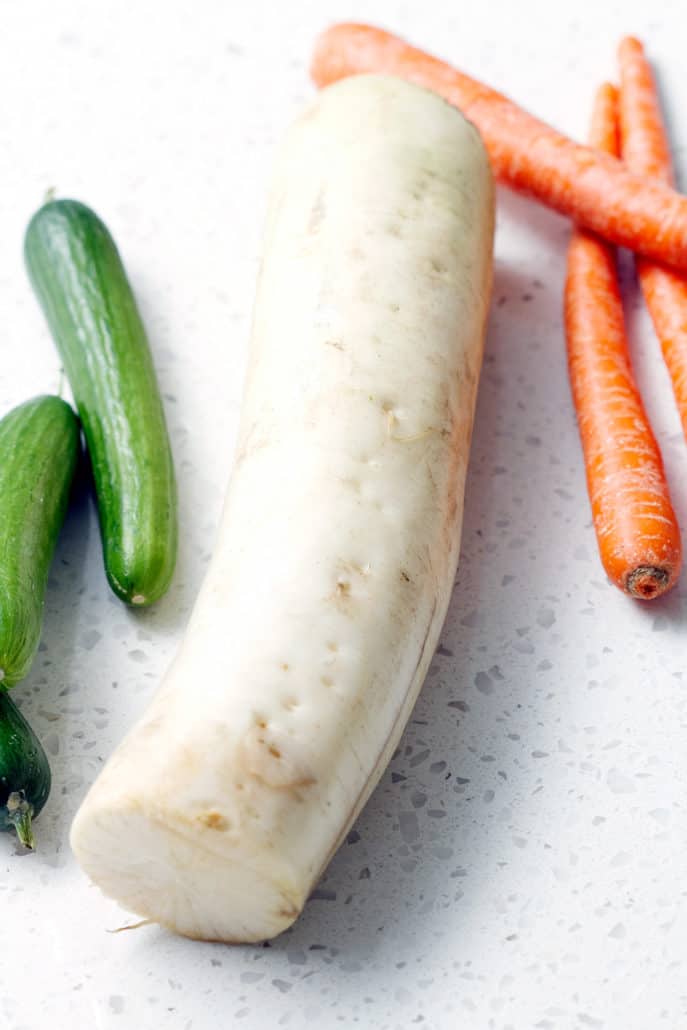 whole persian cucumbers, diakon radish and carrots