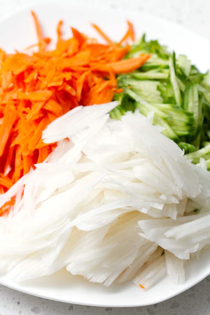 shredded carrots, cucumbers and daikon radish