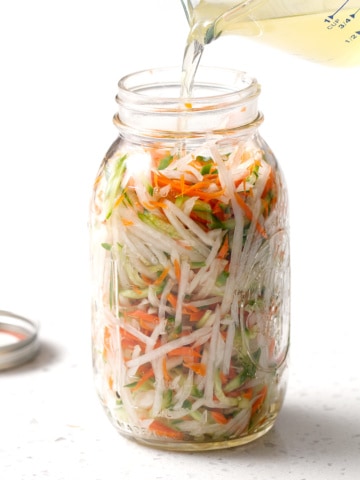 shredded vegetables in large mason jar