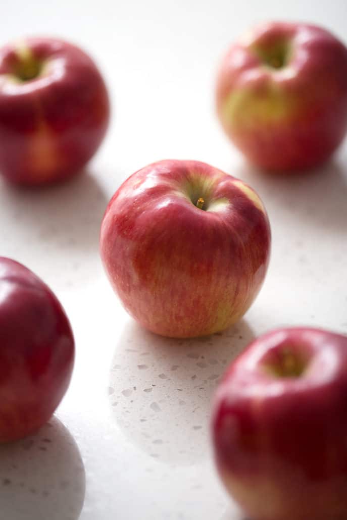 red apples on white background