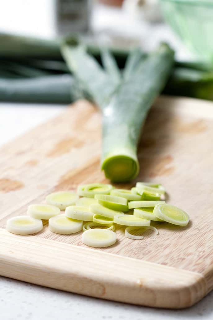 sliced leeks on cutting board