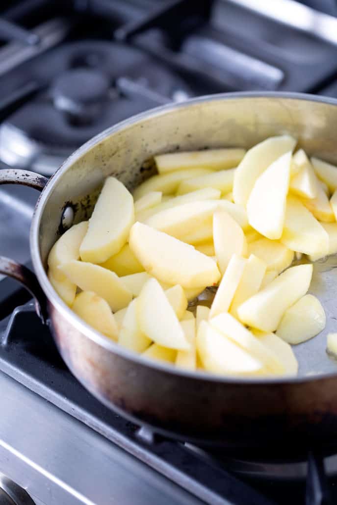 sliced apples in pan on stovetop