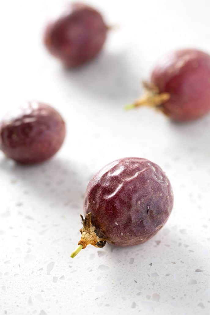 passion fruit on white background with shallow focus