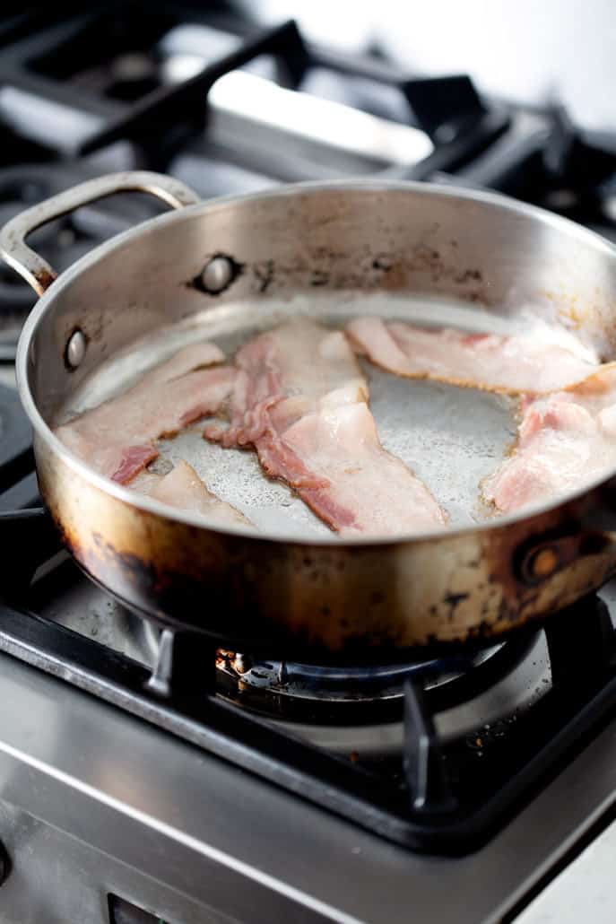 bacon in saute pan on stovetop