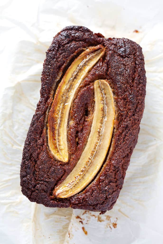 view of aip banana bread from above on white background