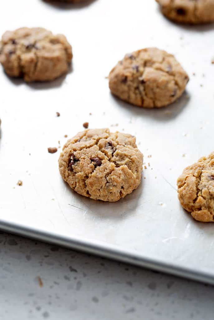allowing chocolate chip cookies to cool on baking sheet