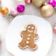 aip gingerbread cookies on white plate with Christmas decorations