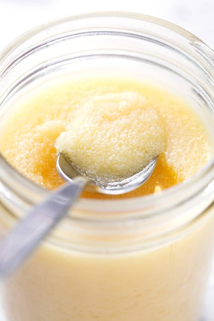 close up of spoonful of instant pot ghee