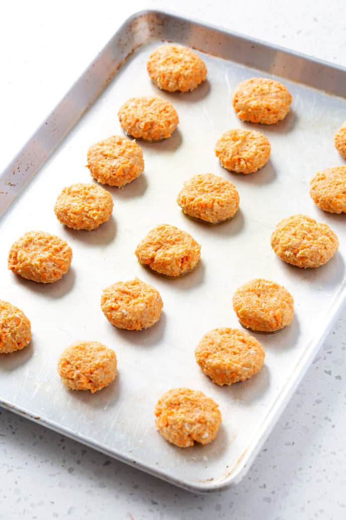 sweet potato chicken poppers on baking sheet ready to be baked
