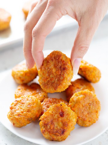 hand picking up sweet potato chicken poppers