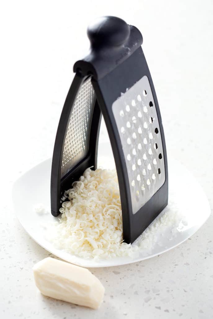 box grater with shredded soap flakes