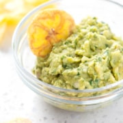 bowl of AIP Guacamole with plantain chip