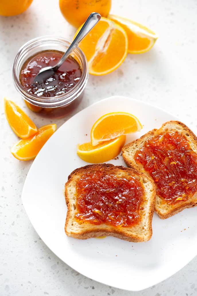 Instant Pot Orange Marmalade on toast and in mason jar