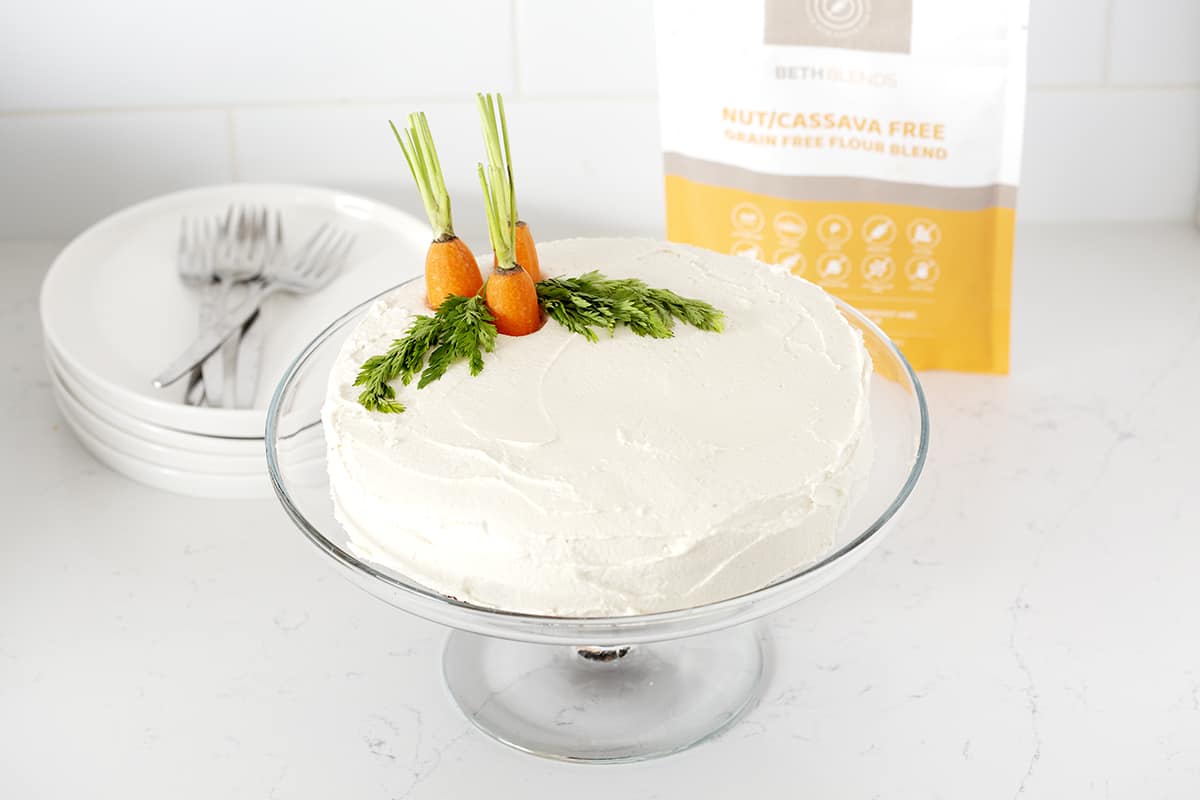Paleo Carrot Cake with bag of Beth Blends on white counter