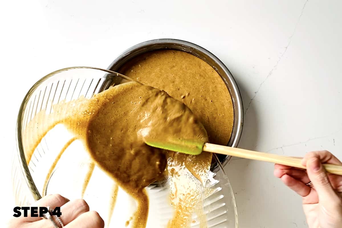 pouring carrot cake batter without nuts into cake pan