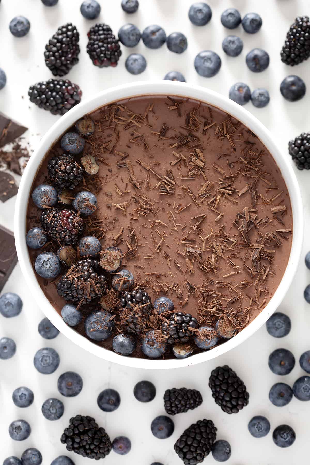 round dish of Chocolate Panna Cotta (Coconut Milk) with berries