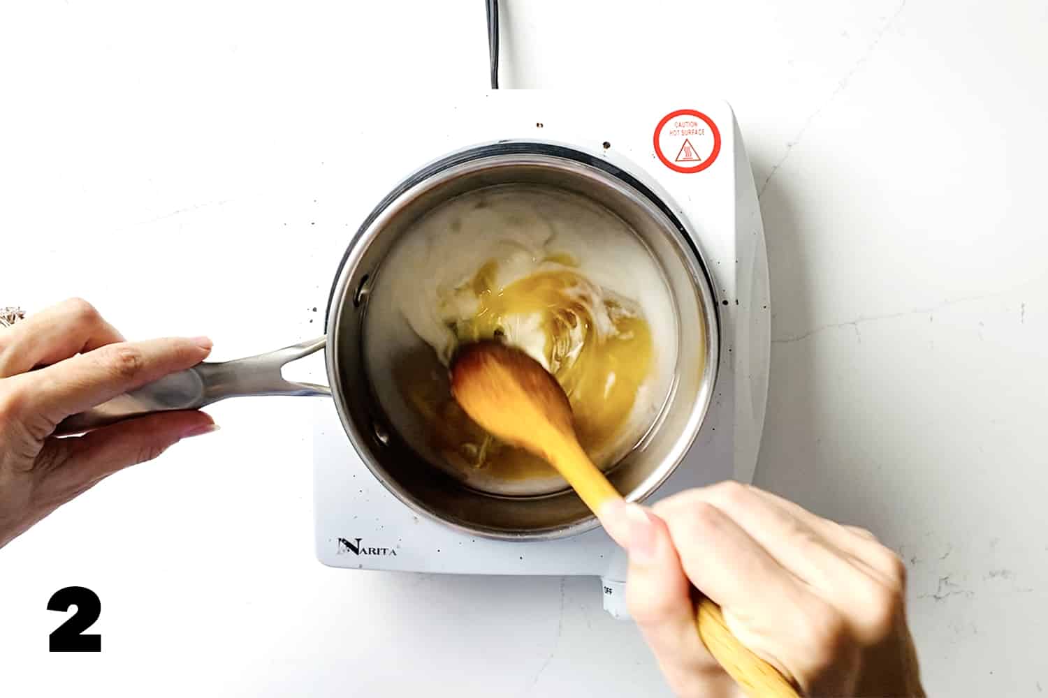 stirring ingredients for banana fudge over stovetop
